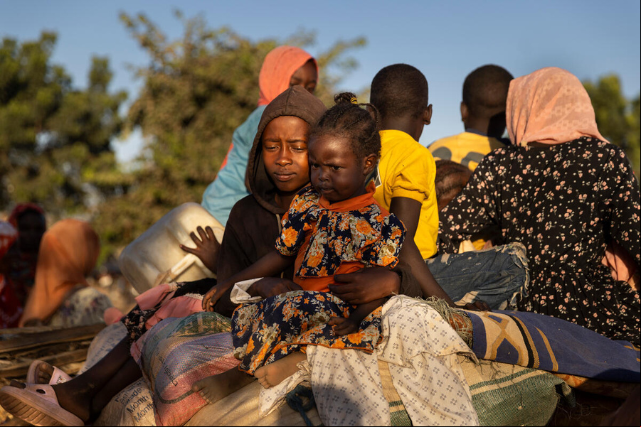The grandchildren of Miriam Adam Idriss, arrive at the Sudanese border in Adre, Chad, after fleeing Sudan with the extended family.
Miriam fled El Geneina in Dafur, on 4 November 2024, with her four daughters and many grandchildren, in search of safety in Chad, after enduring the horrors of the war in Sudan. Seven men from her family were killed, her home was looted and her animals were killed. Food was increasingly scarce and famine loomed. The children in her family had been out of school since the conflict started in April 2023.
“Today, I’m very happy for my family to be safe in Chad, and for the children to go back to school,” Miriam says. “I don’t think I will ever go back to Sudan.” Chad. Sudanese refugees arrive at border in Adre fleeing violence